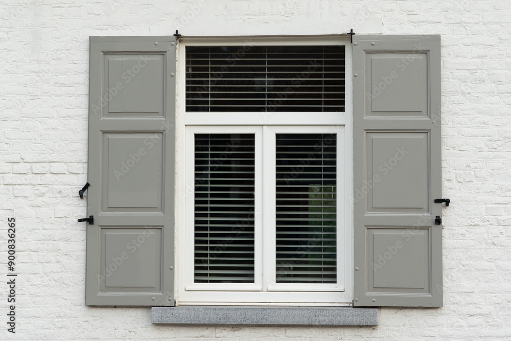 Window with wooden shutters,window decor, wall with beautiful windows, house with shutters,Wooden window village cottage house, decorative exterior shutter, Open wooden shutters. Window with wooden shutters,window decor, wall with beautiful windows, house with shutters,Wooden window village cottage house, decorative exterior shutter, Open wooden shutters.