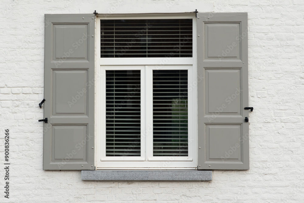Window with wooden shutters,window decor, wall with beautiful windows, house with shutters,Wooden window village cottage house, decorative exterior shutter, Open wooden shutters. Window with wooden shutters,window decor, wall with beautiful windows, house with shutters,Wooden window village cottage house, decorative exterior shutter, Open wooden shutters.
