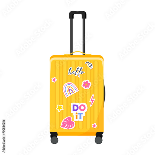 Plastic yellow suitcase in front view with cute stickers isolated on white background.	
