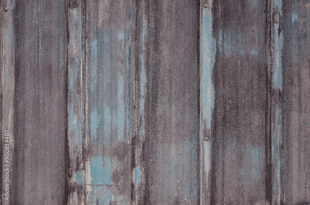 Faded blue and gray tin building industrial grunge backdrop