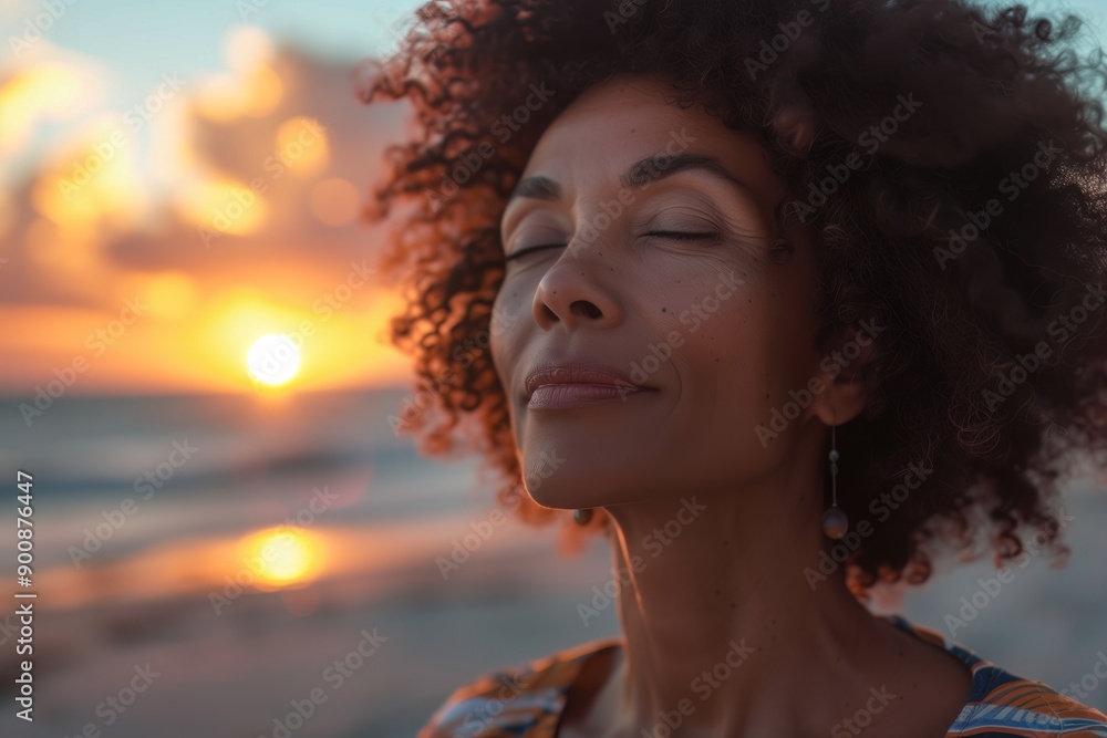 Afro Hairstyle: Mature Woman Savoring a Beach Sunset Afro Hairstyle: Mature Woman Savoring a Beach Sunset