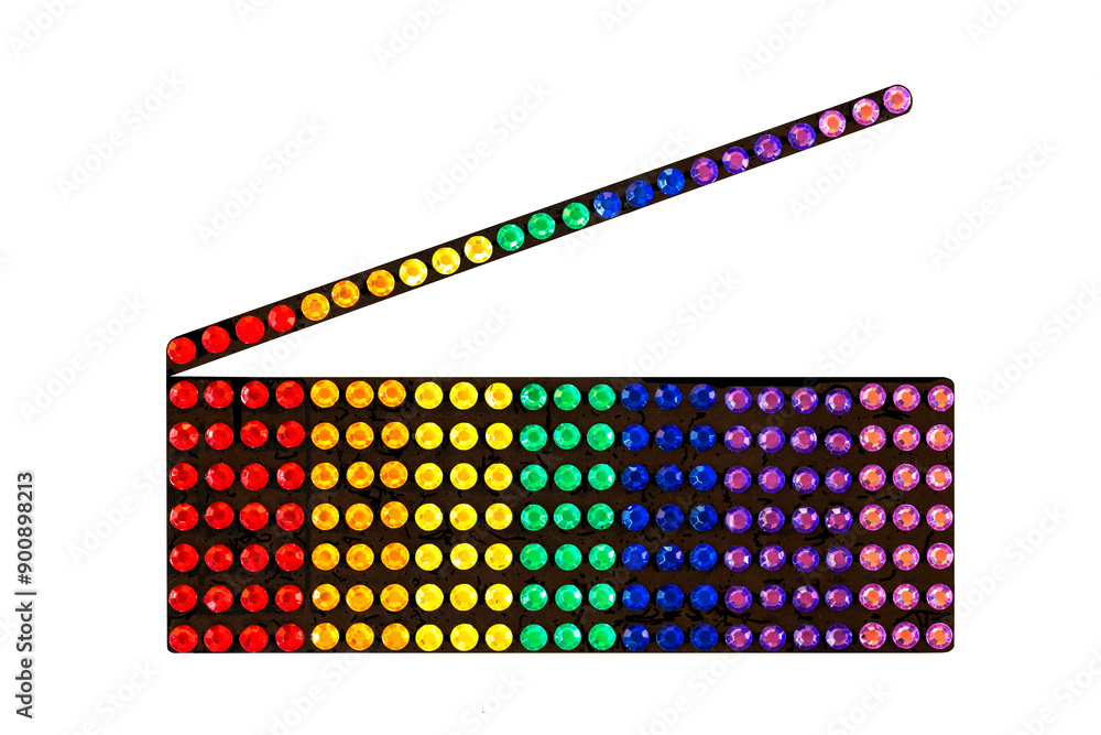 A set of colorful gem facet stones illustrates a rhinestone box of many colors with an open lid. The jewel box has a top cover partially open. The box shows rows of sparkles in all colors. A set of colorful gem facet stones illustrates a rhinestone box of many colors with an open lid. The jewel box has a top cover partially open. The box shows rows of sparkles in all colors.