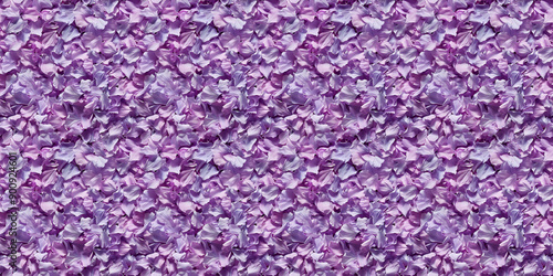 a densely packed texture background of individual lavender petals completely covering the surface © icecreamparadice
