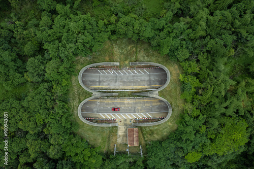 Top view of tunnel a highway and way animals overpass in between Khao Yai National Park and Thap Lan National Park, Prachinburi Province in Thailand. photo