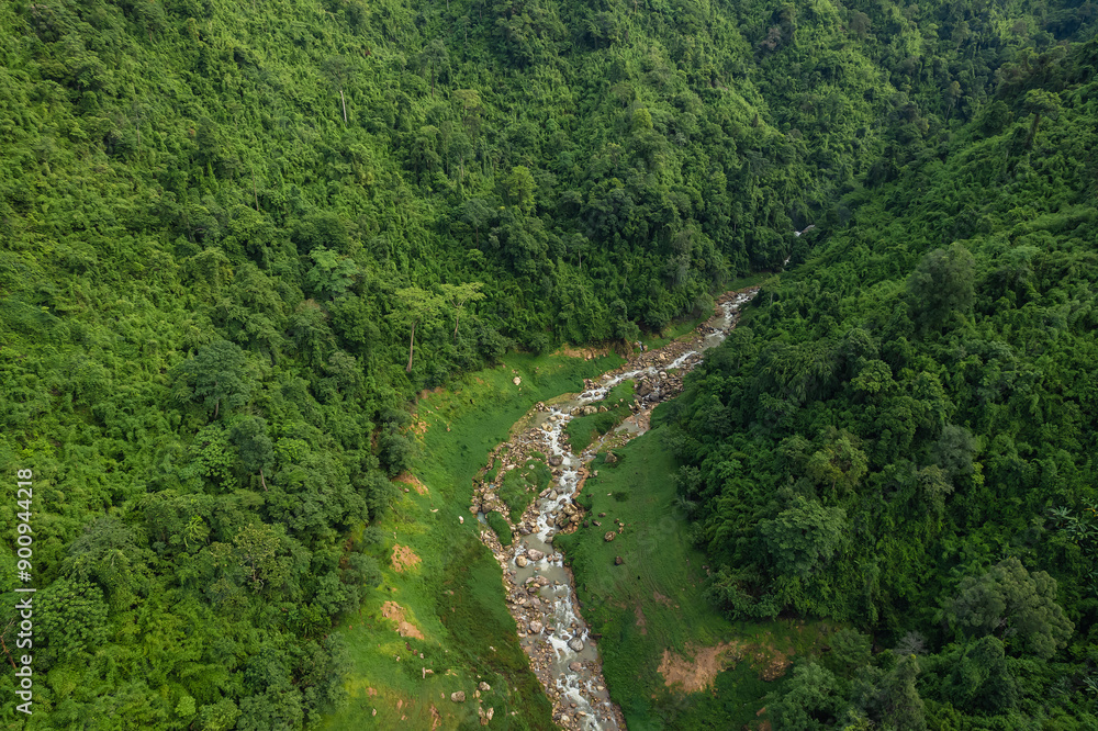 Beautiful aerial top view natural scenery of river in Southeast Asia tropical green forest with mountains in background. Beautiful aerial top view natural scenery of river in Southeast Asia tropical green forest with mountains in background.