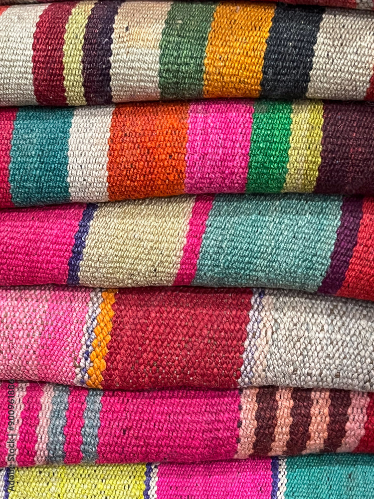 Colourful aboriginal weavings in Tilcara, Argentina.Weavings on the loom Colourful aboriginal weavings in Tilcara, Argentina.Weavings on the loom