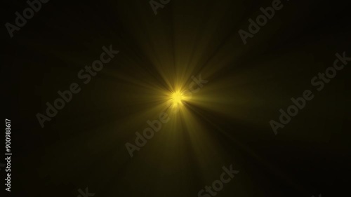 Loop of rays glow orange gold optical flare shine light from the top left animation,
 yellow light beams on black background. sun light lens flares art animation background.