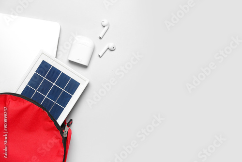 Bag with portable solar pan...