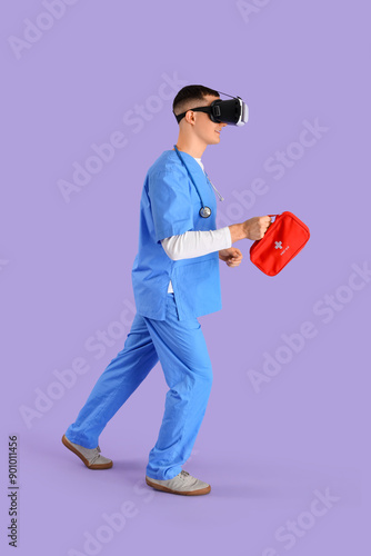 Male doctor with first aid ...