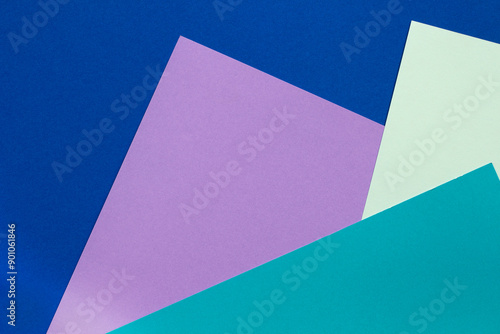 Paper colors shapes layout in blue shades.on background.