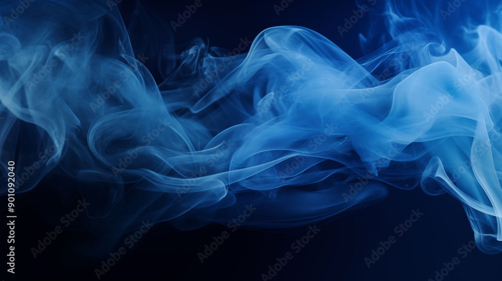 Dark blue smoke or ink swirling gracefully in water on dark background Dark blue smoke or ink swirling gracefully in water on dark background