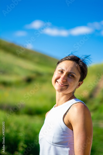 Woman enjoing sun. Summer vocation concept. High quality photo.