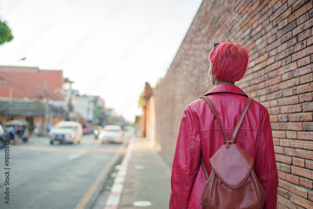 Gen z girl leather fashion with punk Asian woman tourist of local city Southeast Asia travel trendy pink hairstyle young female punk traveler walking around in town Gen z girl leather fashion with punk Asian woman tourist of local city Southeast Asia travel trendy pink hairstyle young female punk traveler walking around in town