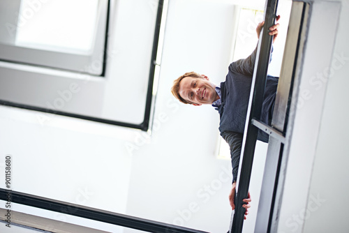 Smile, business man and portrait on stairs with startup mission, professional and finance career. Face below, accountant man and happy on office steps for confidence entrepreneur and corporate work