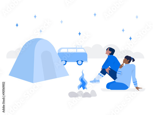 Man and woman stargazing during camping trip