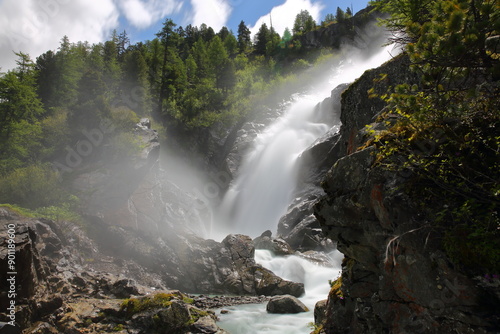 The impressive Rutor waterfalls overlooking the valley towards La Thuile in Italy, Aosta Valley photo