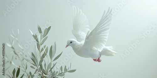 White bird on green plant