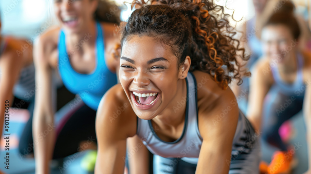 Group of Women Laughing and Exercising in Fitness Class. Healthy and active lifestyle through social group activities. Group of Women Laughing and Exercising in Fitness Class. Healthy and active lifestyle through social group activities.