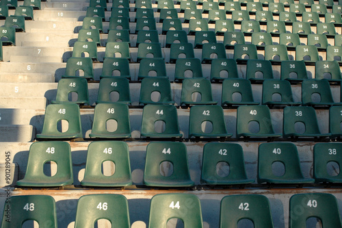 Empty row of chairs in stadium