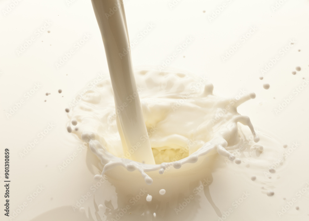 Milk or yoghurt splash from pouring dairy product close up. Milk or yoghurt splash from pouring dairy product close up.