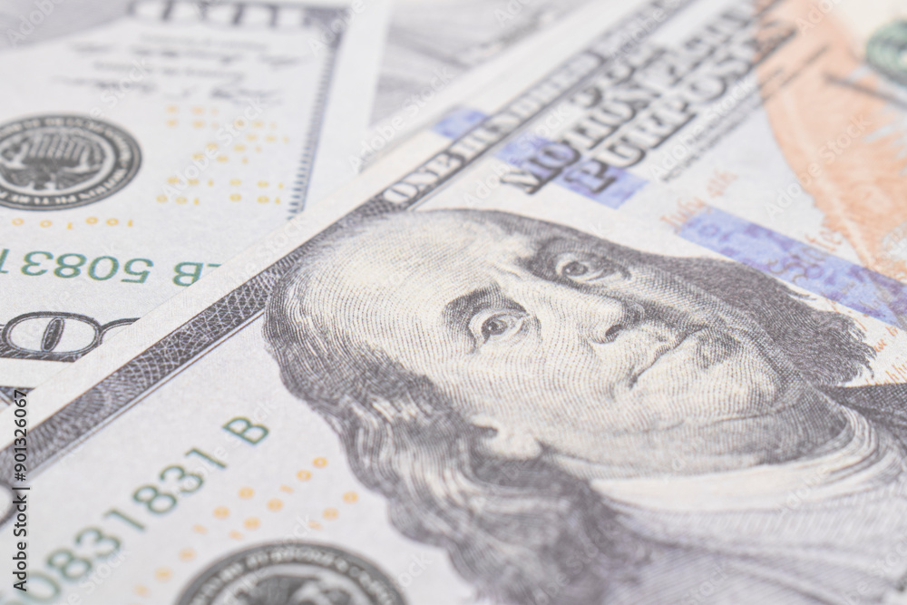 Background of US dollar bills. Selective focus. American vintage money cash, hundred dollar bills. Texture US dollars Background of US dollar bills. Selective focus. American vintage money cash, hundred dollar bills. Texture US dollars