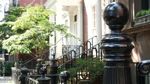 New York City townhouse building, Brooklyn Heights residential district, USA. Brownstone urban architecture, attached house. United States real estate, american property, apartments and homes in NYC.