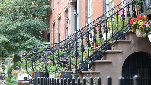 New York City townhouse building, Brooklyn Heights residential district, USA. Brownstone urban architecture, attached house. United States real estate, american property, apartments and homes in NYC. photo