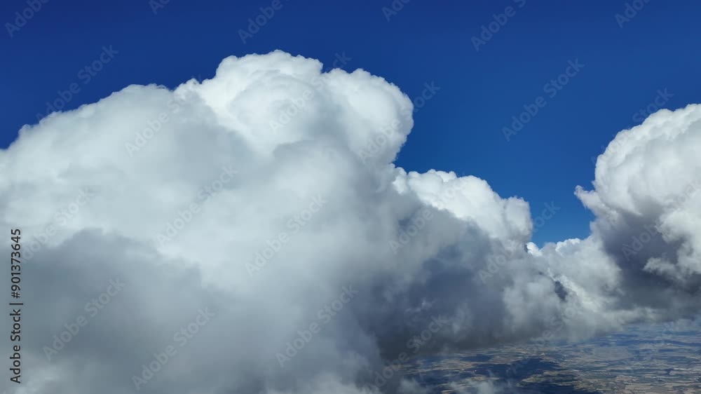 Pilot POV in a real time flight through a deep blue sky with some white cumulus clouds. Immersive cockpit view. 4K 60FPS. Pilot POV in a real time flight through a deep blue sky with some white cumulus clouds. Immersive cockpit view. 4K 60FPS.