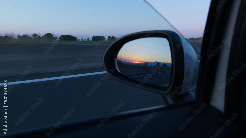 Close up shot car mirror looking at vibrant colorful sunset summer day Close up shot car mirror looking at vibrant colorful sunset summer day