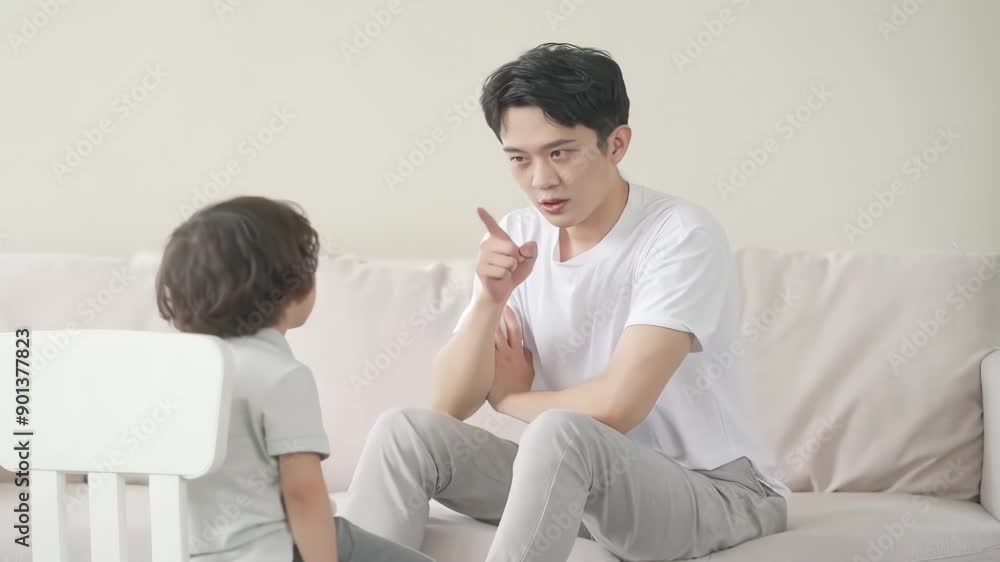 Happy family father, child son chatting and play games joyful atmosphere toys together at home, enjoying leisure time in living room Happy family father, child son chatting and play games joyful atmosphere toys together at home, enjoying leisure time in living room