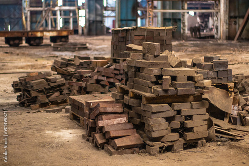 Old factory with objects abandoned inside and growing nature, power of life