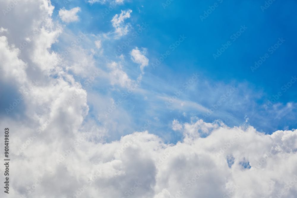Blue sky and white clouds in sunny bright light Blue sky and white clouds in sunny bright light