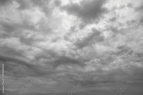 Sky with a shroud of gray clouds to the horizon closed sunlight, black and white photo of gray sky