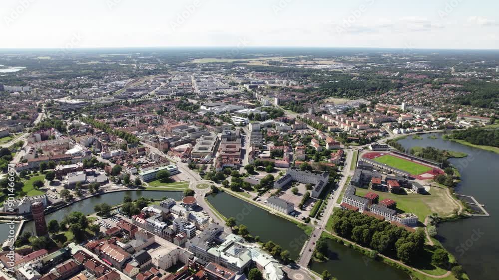 Fly sideways with view over Kalmar town, buildings, trees and more Fly sideways with view over Kalmar town, buildings, trees and more