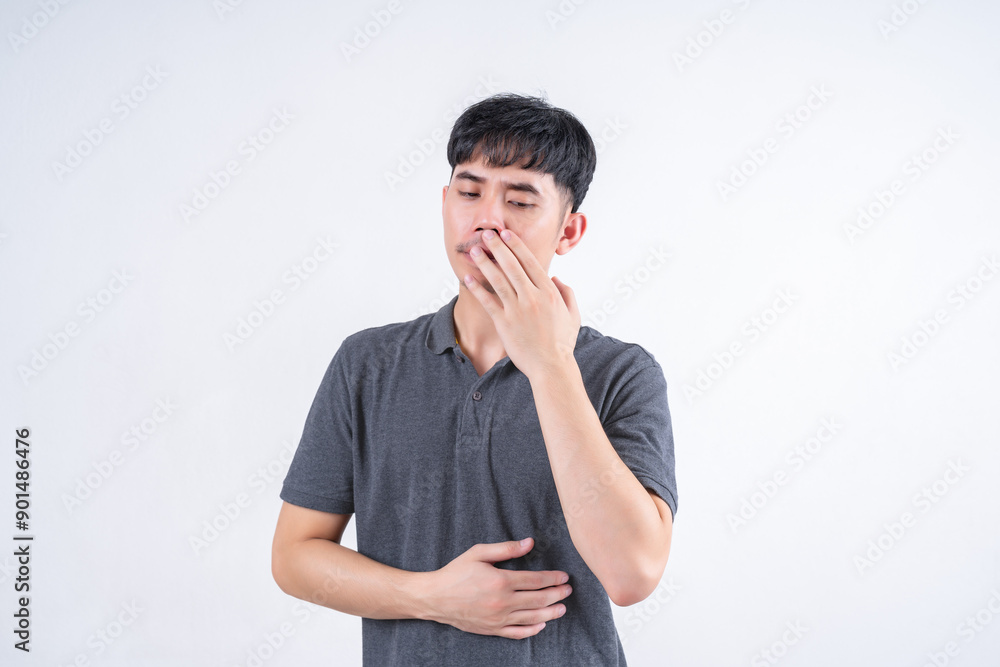 Portrait of handsome Asian man with mouth pain due to tooth decay and gingivitis. Medical and healthcare concept on white background. Portrait of handsome Asian man with mouth pain due to tooth decay and gingivitis. Medical and healthcare concept on white background.