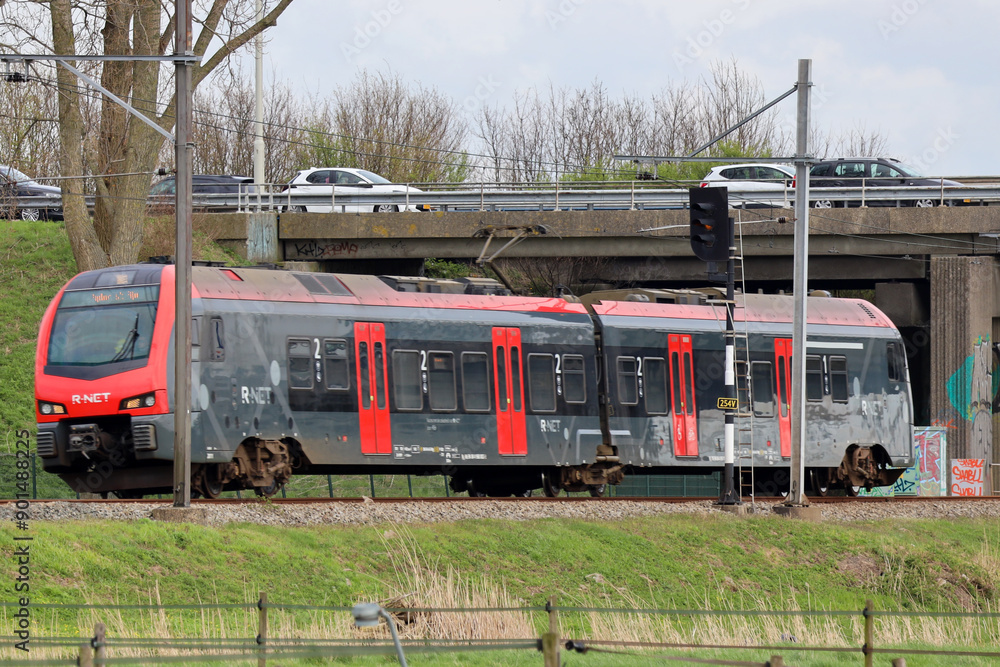 Naklejka premium R-Net train between gouda and alphen aan den Rijn at Moordrecht