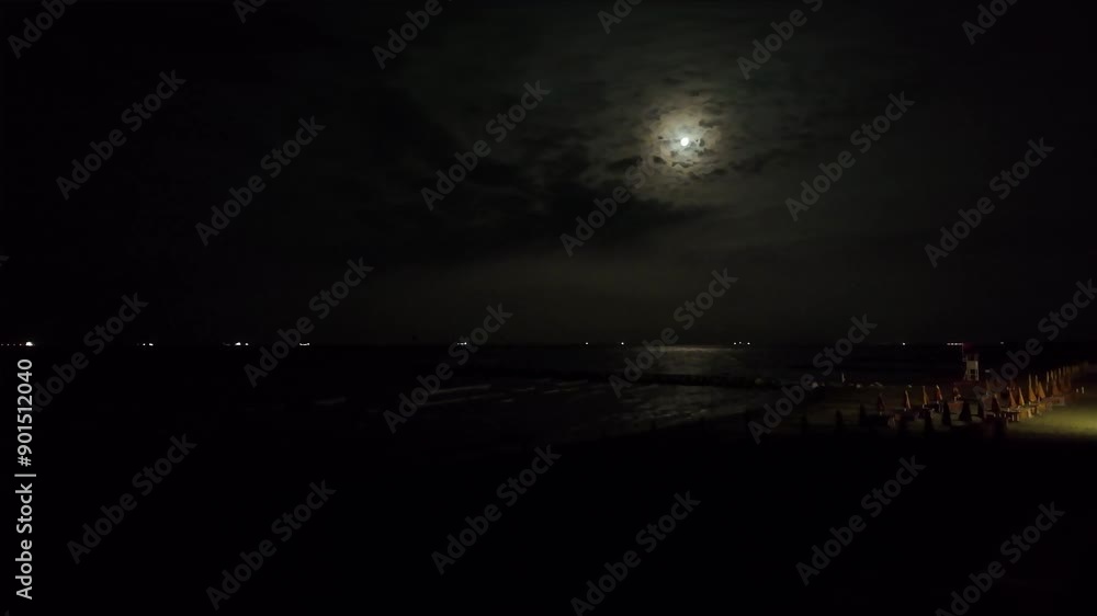 A moon at night on the beach, time lapse, video 4k, 30fps A moon at night on the beach, time lapse, video 4k, 30fps