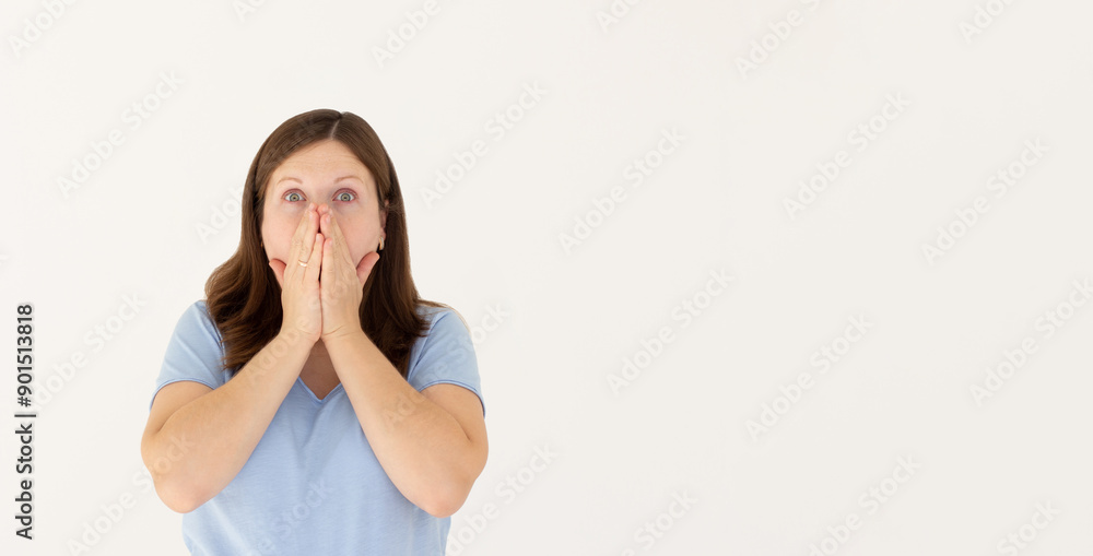 Shocked surprised female model being shocked by something, looks surprised, recieves shock news, isolated over white background. Shocked surprised female model being shocked by something, looks surprised, recieves shock news, isolated over white background.