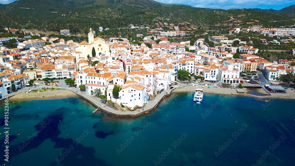 aerial view over the Badia de Cadaqués, to the old white houses of Cadaqués and the church Santa Maria de Cadaqués, Port Alguer and the Mediterranean Sea, Girona, Catalonia, Spain aerial view over the Badia de Cadaqués, to the old white houses of Cadaqués and the church Santa Maria de Cadaqués, Port Alguer and the Mediterranean Sea, Girona, Catalonia, Spain