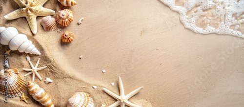 Summer-themed design with a textured sandy background, ideal for advertising with a copy space image. photo