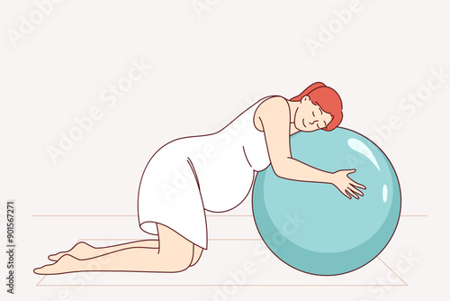 Pregnant woman doing pilates on fitness mats and leaning on inflatable ball. Preparing for childbirth for pregnant girl who cares about health and takes preventive measures to combat difficulties