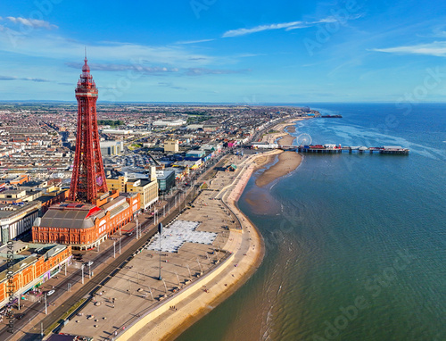 Aerial Image of Blackpool Tower along the Fylde Coast, Lancashire during a lovely Summer evening on the Sea front. 28th July 2024. photo