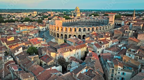 Panorama of ancient town Arles in Provence and Cote d'Azur, France, South Europe. Aerial view of Ancient, 2-tiered Roman gladiatorial amphitheatre hosting bullfighting and community events.