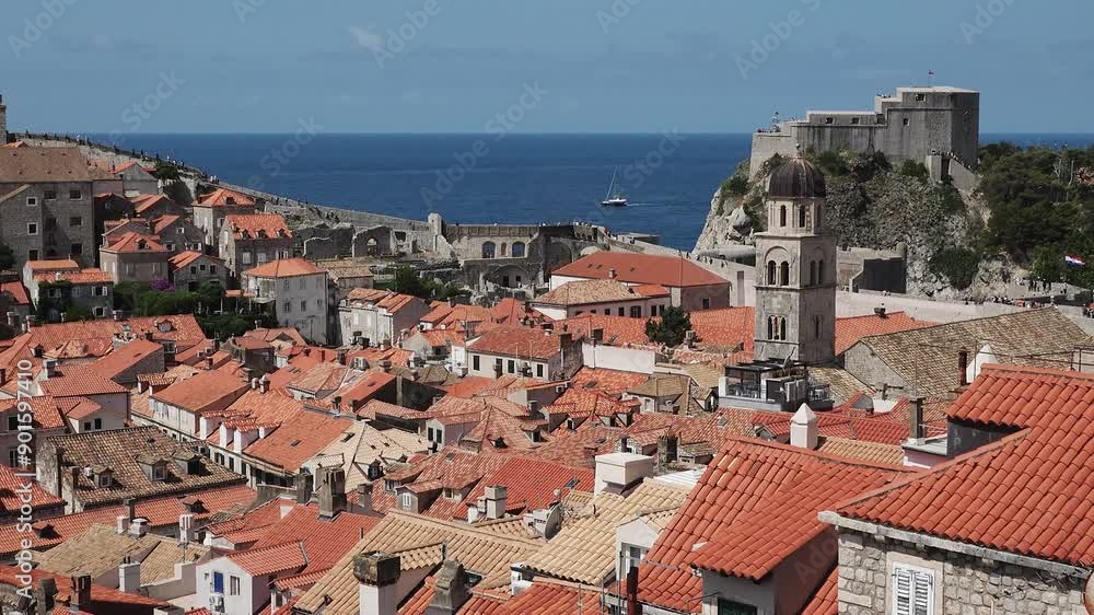 Stunning View of Dubrovnik's Red Roofs and Coastal Landscape on a Sunny Day Stunning View of Dubrovnik's Red Roofs and Coastal Landscape on a Sunny Day