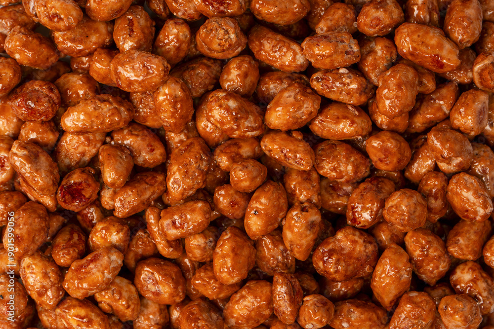 Tasty sweet roasted peanuts as a background. Tasty sweet roasted peanuts as a background.