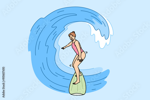 Woman surfer rides waves on surfboard, enjoying active summer holiday at seaside resort. Girl surfer does extreme sports during vacation, wanting to get adrenaline rush from surfing.