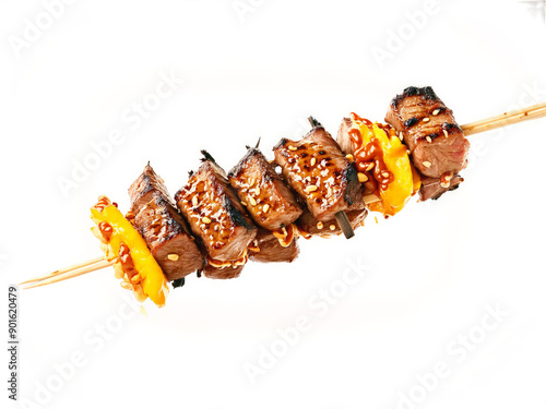 Sosatie colorful skewer of marinated meat sosatie grilled to perfection and served with side photo