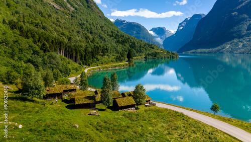 Grass-Roofed Cabins by a Norwegian Fjord, lovatnet lake Lodal valley Norway photo