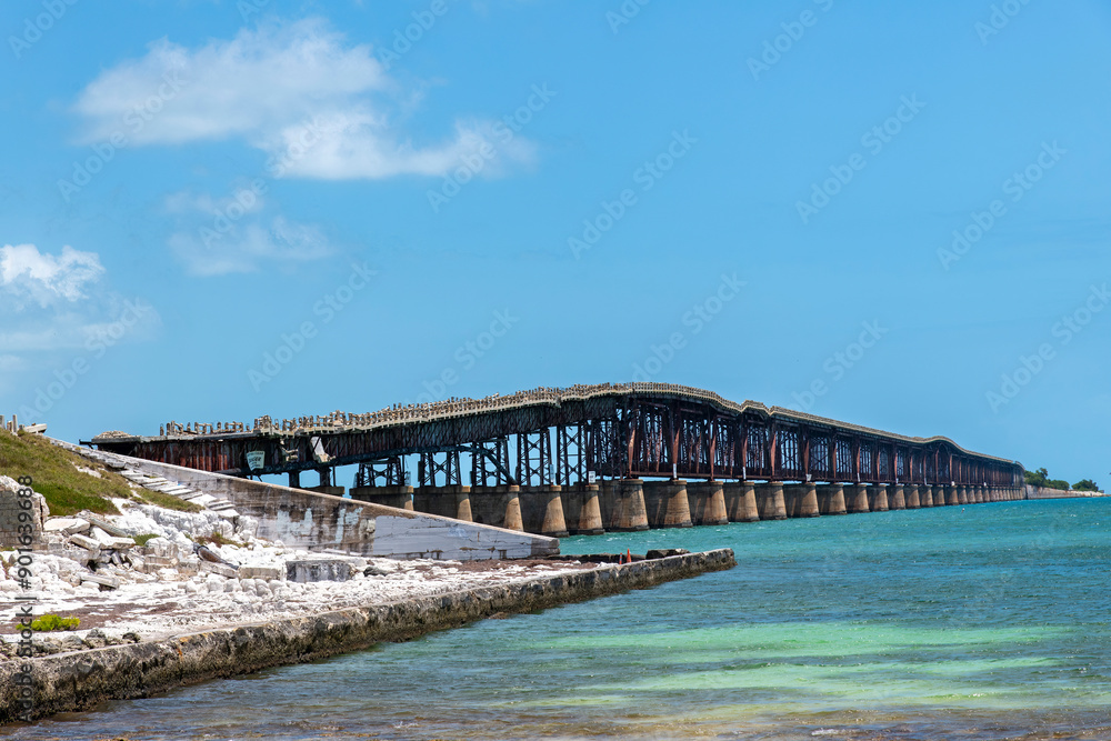 Fototapeta premium Side view of Old Flagler RailRoad Bridge or Bahia Honda Rail Bridge a derelict railroad bridge in the lower Florida Keys, FL, USA connecting Bahia Honda Key with Spanish Harbor Key