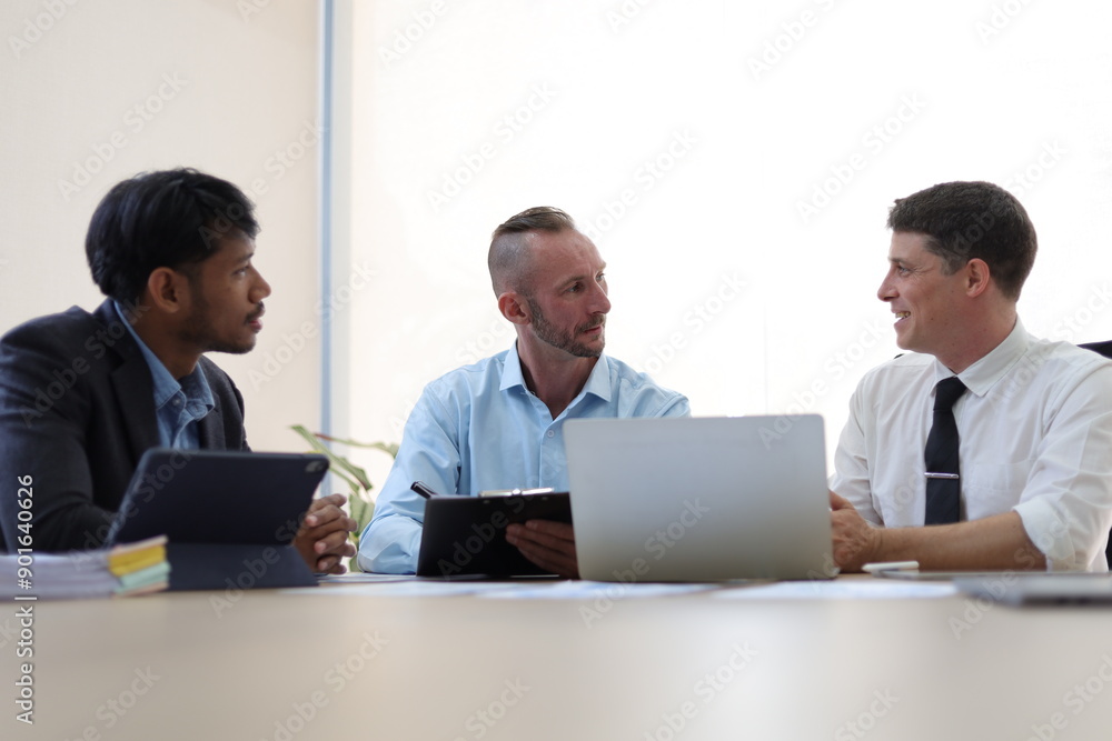 Business meeting, group of business executives meeting to discuss planning the collaboration of people in the company. Teamwork meeting business people in office workplace. Business meeting, group of business executives meeting to discuss planning the collaboration of people in the company. Teamwork meeting business people in office workplace.